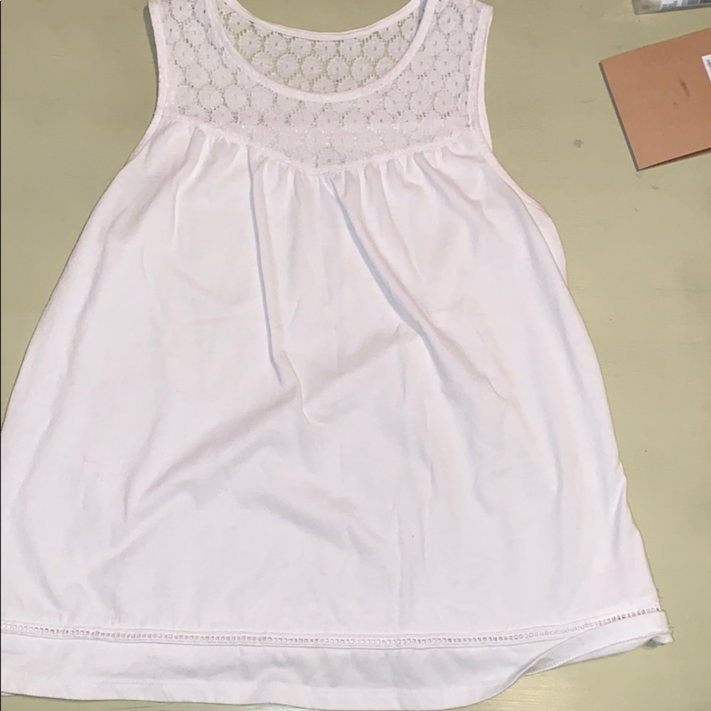 A white tank top. With lace. 100% cotton